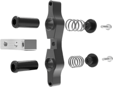 Load image into Gallery viewer, Tamer Double Button X Wing black suspension component with dual buttons, designed for secure vehicle mounting and stability.