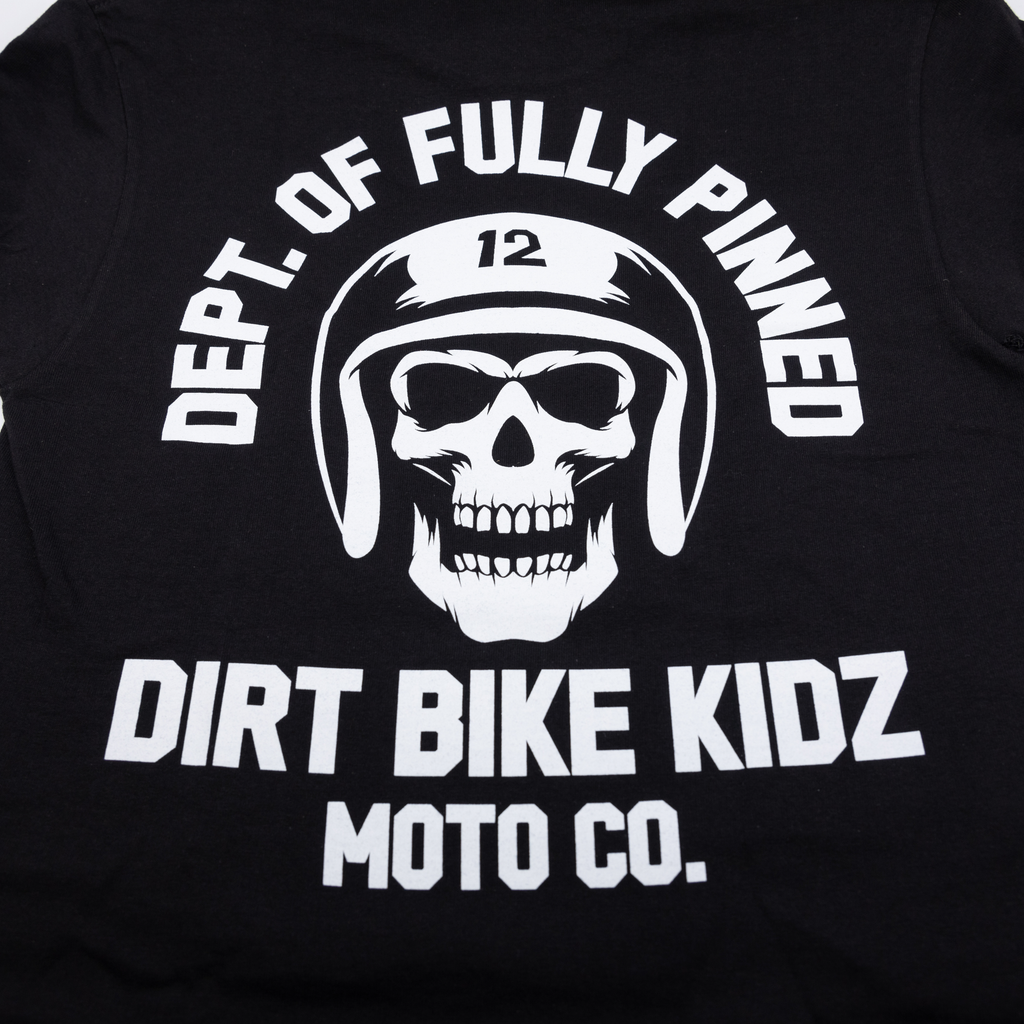 Black Fully Pinned Tee shirt by DBK featuring a relaxed fit and pin detail, displayed flat on a white background.