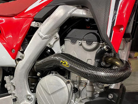 P3 brand heat shield for Honda exhaust system, made of durable material, with a metallic finish and mounting brackets visible.