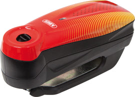 ABUS 7000 RS1 3D Alarm Disc Lock in Sonic Red, showing the durable metal lock with red finish and key mechanism.