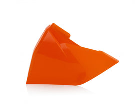 Acerbis orange airbox cover for motorcycle, with branding and vent details, designed to fit Acerbis models.