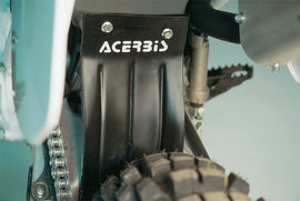 Acerbis black airbox mud flap for off-road motorcycles, designed to protect the airbox from debris and mud.