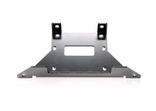 Load image into Gallery viewer, WARN winch mount bracket for off-road vehicles, featuring sturdy metal construction and secure mounting points.