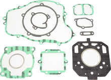 Load image into Gallery viewer, Athena Complete Gasket Kit for Kawasaki 68-0420, featuring various gaskets and seals laid out on a clean surface.