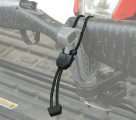 ATV-TEK Elite Series slide and lock universal snubber for ATV security, shown in a close-up of the black device.