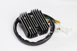 RICKS electrical regulator and rectifier with metal casing and wiring connections, designed for motorcycle electrical systems.