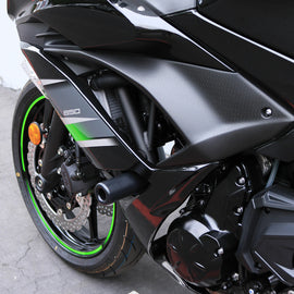 Black Kaw body frame sliders by SHOGUN for motorcycle protection, shown mounted on a bike with visible mounting hardware.