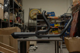 CONE PERFORMANCE 2:1 Sweeper Performance Exhaust for Harley Softail 2018-2026, stainless steel, with sleek design and dual outlets.