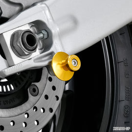 ZETA gold M6 swingarm spools for motorcycle body, designed for secure wheel suspension and easy tire changes.