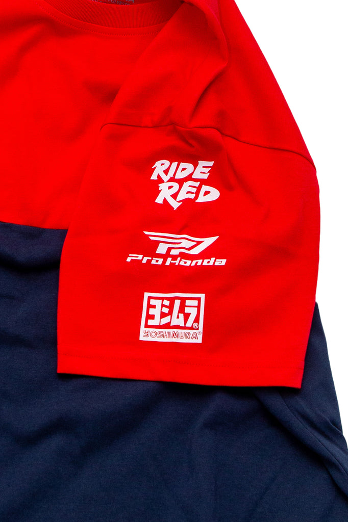 D-COR Honda Team2 Navy T-shirt, casual shirt featuring Honda branding, displayed on a hanger with a plain background.