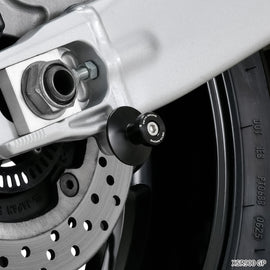 Black ZETA M6 swingarm spools for motorcycle body, designed for easy installation and secure attachment.