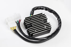 RICKS electrical regulator and rectifier for motorcycle, mounted on a metal frame with wiring visible.