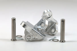 WORKS Aluminum Foot Peg Mounts for YZ 2-Stroke motorcycles, durable foot controls for off-road riding.