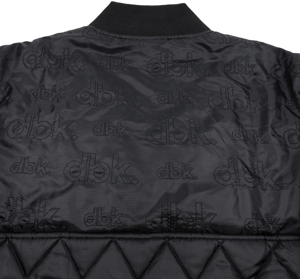 Black DBK liner jacket in size 3X with a sleek, fitted design, featuring a zip front and lightweight fabric for versatile wear.