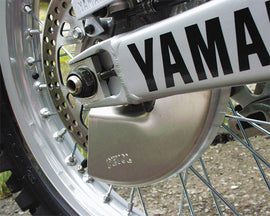 Devol Yamaha YZ250 rear disc guard in black, protecting the rear brake disc of the Yamaha YZ250 motorcycle.