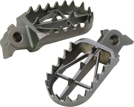 DRC Wide Footpegs for motorcycle foot controls, showing durable metal construction and textured surface for grip.