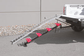 REVARC Mx Ramp 96.5-inch x 12-inch trailer ramp for towing, showing textured surface and sturdy construction.