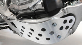 WORKS Skid Plate guard for off-road vehicles, made of durable material, shown mounted on vehicle underside for protection.