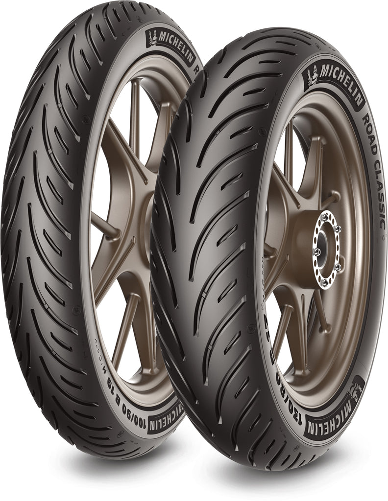 Michelin Road Classic rear motorcycle tire 130/80B17 65H bias-TL with tread pattern visible on black rubber tire.