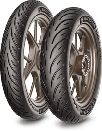 Michelin Road Classic rear motorcycle tire 130/80B17 65H bias-TL with tread pattern visible on black rubber tire.