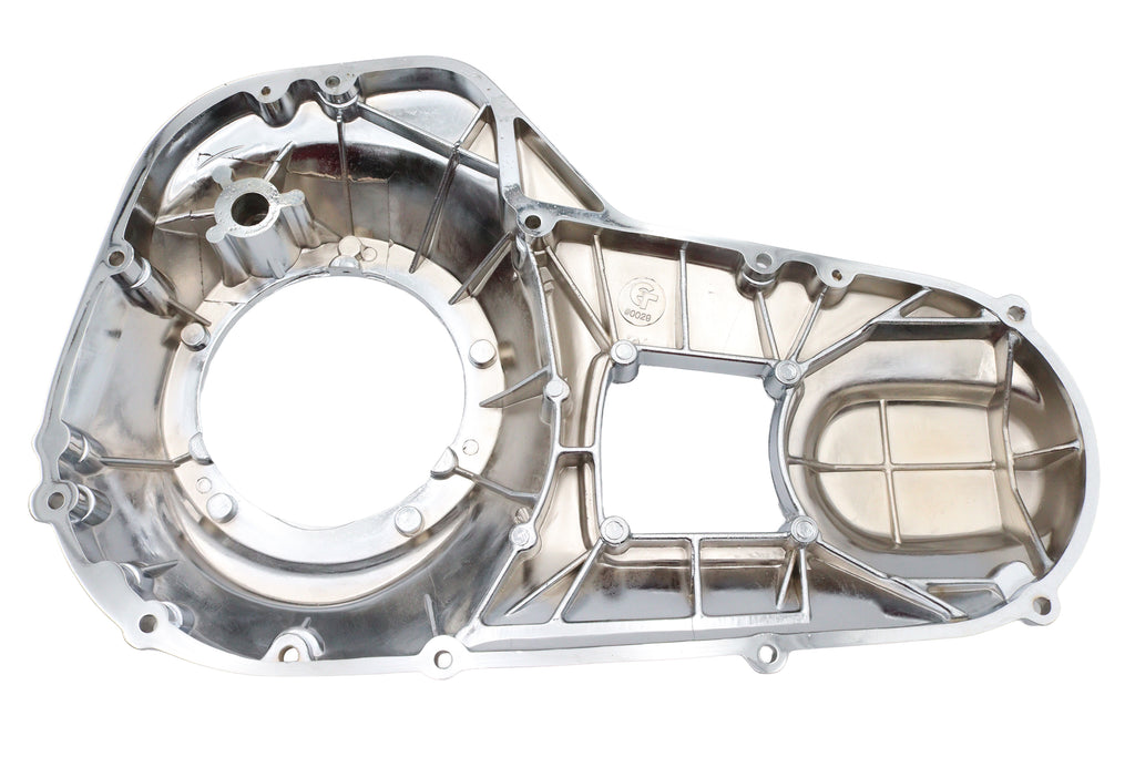 Motorshop chrome outer primary cover for drive line, showcasing shiny chrome finish and detailed design on a motorcycle part.
