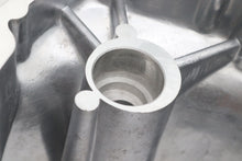 Load image into Gallery viewer, Motorshop drive line factory sample polished outer primary cover for motorcycle, showing a smooth, shiny metal finish.