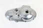 Polished Motorshop primary drive line cover showing a shiny, smooth finish on a black automotive component.