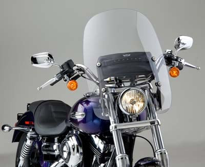 National Cycle Spartan Quick Release Windshield on a motorcycle, clear and securely attached to sissy bar for protection.