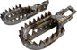 Titanium Beta foot pegs from RAPTOR for motorcycle foot controls, featuring durable metallic construction and a sleek design.