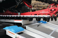 Load image into Gallery viewer, REVARC sled track riser for trailer towing, showing sturdy metal construction and secure mounting features for safe hauling.