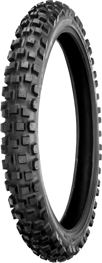Shinko Tire 504 Series front 80/100-21 bias tire on a Honda CRF250 motorcycle, showing tread pattern and sidewall details.