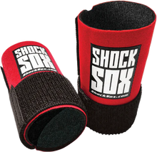 Load image into Gallery viewer, Red Shock Sox 4-inch conventional forks for bicycles, featuring durable construction and vibrant color, designed for bike suspension systems.