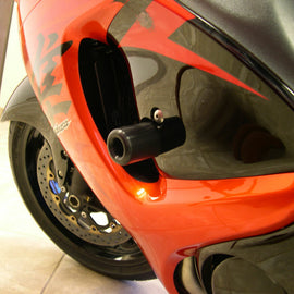 Black SHOGUN Frame Sliders for motorcycle body protection, featuring a sturdy design and mounting brackets.