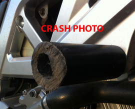 Black SHOGUN Frame Sliders for motorcycle body protection, designed to absorb impacts and prevent damage during falls.