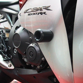 SHOGUN black body frame sliders for motorcycle protection, shown in a close-up image highlighting their sleek design and durable construction.