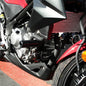 Black Shogun Frame Sliders for motorcycle body protection, no cut design, mounted on a motorcycle frame.