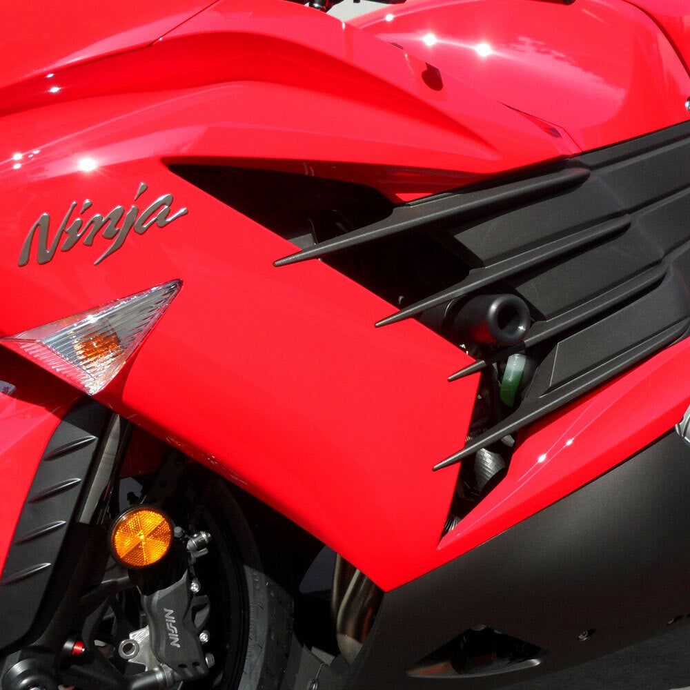 Black SHOGUN Frame Sliders No Cut for motorcycle body protection, shown mounted on bike in this image.