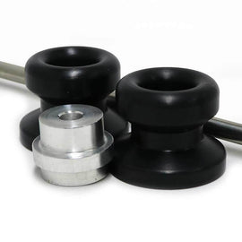Black Shogun front axle sliders for motorcycle body protection, featuring durable design and secure mounting.