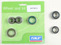 SKF rear drive wheel seal kit with bearings, showing the sealed components and metal housing for vehicle wheel assembly.