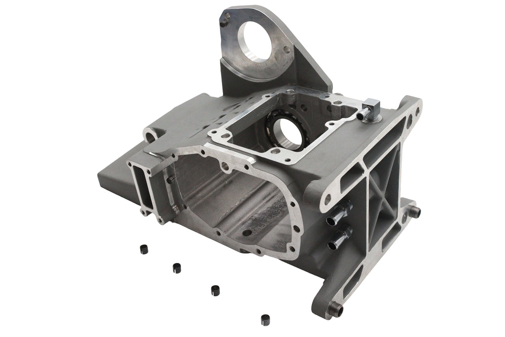 Silver Ultima 6-speed transmission case, showcasing the durable metal housing and detailed construction of the Ultima brand transmission.