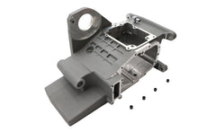 Load image into Gallery viewer, Silver Ultima 6-speed transmission case, durable metal housing for automotive transmission systems.