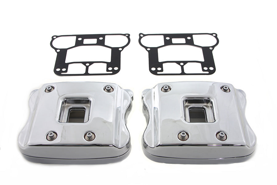 Chrome V-Twin engine rocker box cover set with intricate design for Harley-Davidson motorcycles.