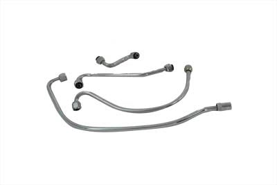 V-TWIN chrome oil line set installed on motorcycle oil tank, showcasing shiny metal tubing and fittings for V-TWIN oil tank.