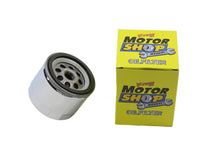 Load image into Gallery viewer, V-TWIN Hex Spin-On Oil Filter attached to motorcycle oil tank, showcasing durable V-TWIN brand oil filter for easy replacement