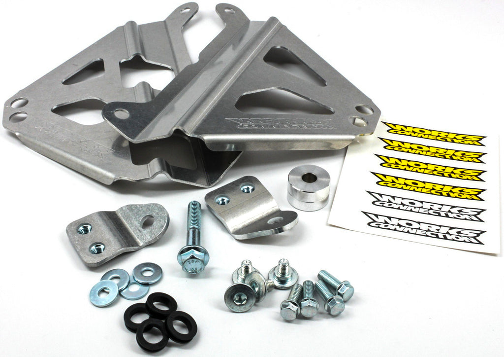 Pair of WORKS Radiator Braces, durable guards designed to protect and support car radiators in automotive applications.