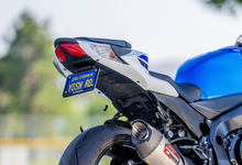 Load image into Gallery viewer, YOSHIMURA Fender Eliminator V2 Kit for Suzuki motorcycle, close-up of black body component with mounting details.