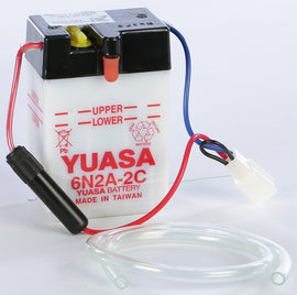 Yuasa 6N2A-2C conventional motorcycle battery, model 49-1615, with positive and negative terminals visible.