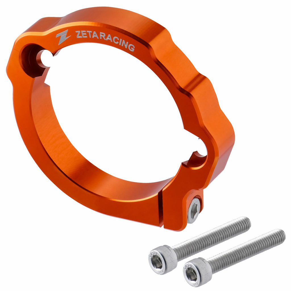 Orange ZETA exhaust flange guard, metal protective cover for motorcycle exhaust system, with a sleek, durable design.
