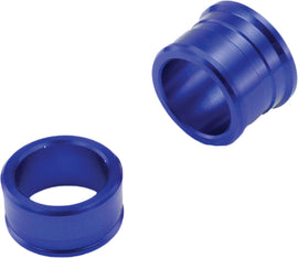 Rear blue ZETA wheel spacers for off-road vehicles, designed to enhance wheel fitment and stability.