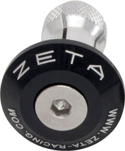 Load image into Gallery viewer, Black ZETA bar end plug, designed for bicycle handlebars, featuring a sleek finish and durable construction.